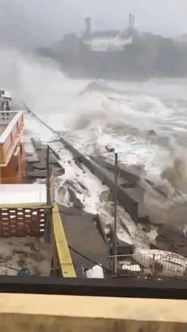 Waves Crash Against Homes in Hong Kong During Typhoon Mangkhut