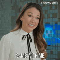 TV gif. Sutton Foster as Liza on Younger smiles and nods, saying, "same with me."