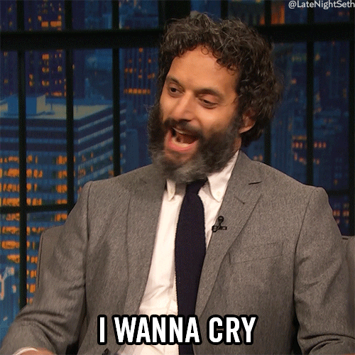 Late Night gif. Actor Jason Mantzoukas gestures down his face like tears and says "I wanna cry."