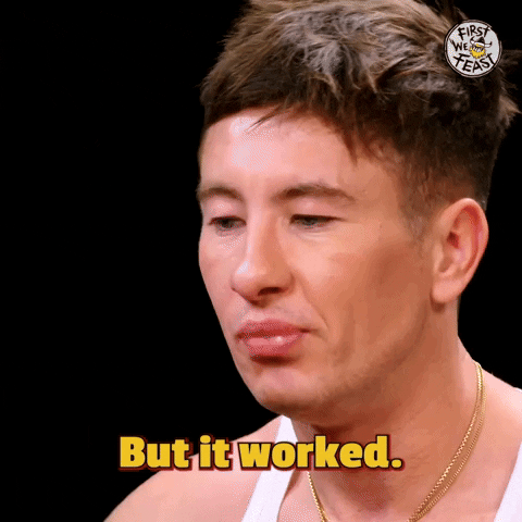 Celebrity gif. Barry Keoghan is being interviewed on Hot Ones and he shrugs his shoulders and he says, "But it worked," before pausing and glancing down for a split second and then saying, "I think," with a smile.