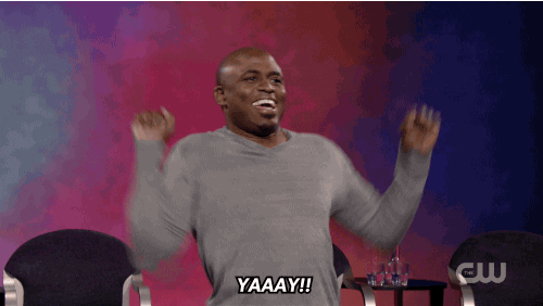 TV gif. Wayne Brady on Whose Line Is It Anyway smiles as his whole body shakes and his arms flail wildly. Text, "Yay!"