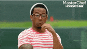 TV gif. A man from Master Chef in a striped shirt and hat strokes his beard and nods affirmingly.