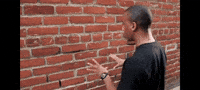 Man Talking To Wall GIF