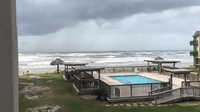 Ominous Clouds, Rough Surf Precede Tropical Storm Harold Landfall in South Texas