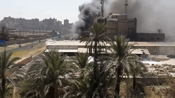 Plume of Black Smoke Rises From Factory in Cairo