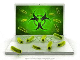 Video gif. A biohazard sign is on a computer screen and virus bits float around it. The virus has also been realized in real life as some parts of it sit on the laptop physically.
