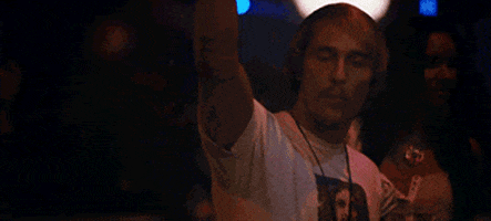 Movie gif. Matthew McConaughey as Wooderson in Dazed and Confused, with his arm raised, then lets his arm fall, pointing his finger. The image freezes here and text appears, "this."
