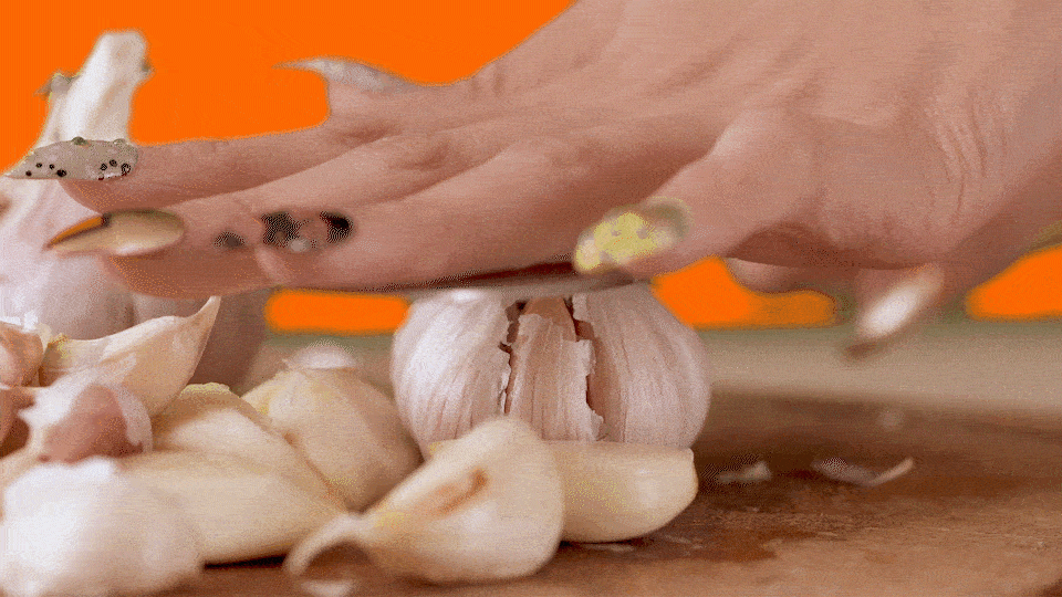 garlic cloves cooking GIF