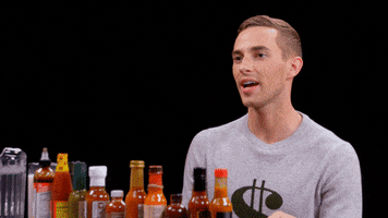Adam Rippon Wings GIF by First We Feast: Hot Ones