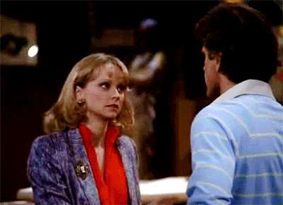 TV gif. Shelley Long and Ted Danson as Diane Chambers and Sam Malone in Cheers exchange hard slaps to the face before Diane yanks Sam violently by the nose.