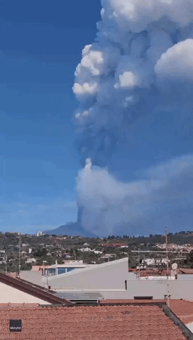 Plume Rises Into Sicilian Sky as Mount Etna Continues to Erupt