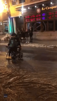 Man in Wheelchair Cheered On While Doing Donuts on Icy Quebec Road