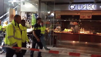 Covered by a Sheet, Suspect in Rotterdam Central Security Alert Taken Into Custody