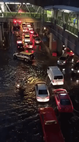 Motorists Drive Through Flooded Roads Near Bangkok After Thunderstorm