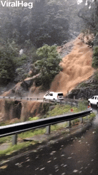 Flooding Waterfall Threatens Bridge