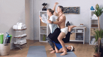 Ad gif. Ad for Poo-Pourri. Three people are on a yoga mat and one is laying with their legs up on the ground while the other two sit on him like a toilet.