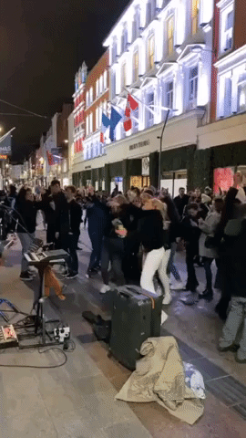 Crowd Parties on Dublin Street Hours Before Nationwide Lockdown