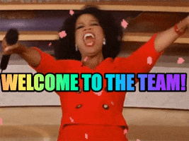 Celebrity gif. From the stage of her show, confetti falls around Oprah Winfrey, who screams in excitement, holding her arms out to us. Text, “Welcome to the team!”