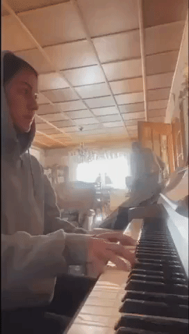 Grandpa With Alzheimer's Disease Gives Thumbs Up for Granddaughter's Piano Playing