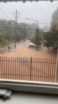 Cars Submerged Amid Severe Flooding Near Atlanta College Campus
