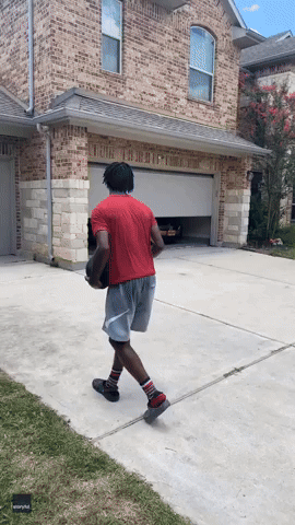 Texan Perfects Impressive Basketball Trick Shot From Roof