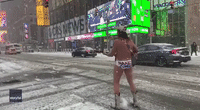 Times Square Fixture 'The Naked Cowboy' Keeps Performing as Heavy Snow Falls in Manhattan
