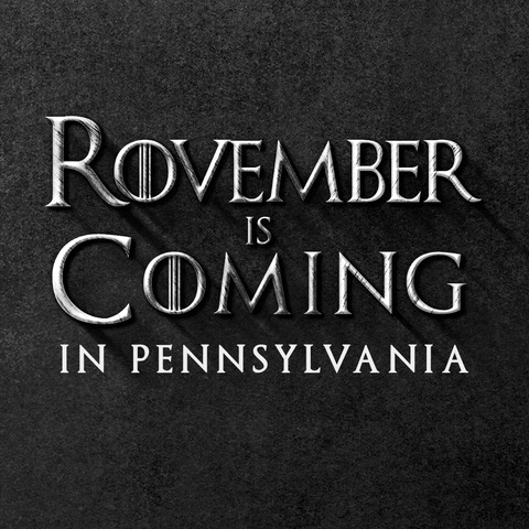 Text gif. In gray Game of Thrones font against a stony black background reads the message, “Rovember is Coming in Pennsylvania.”
