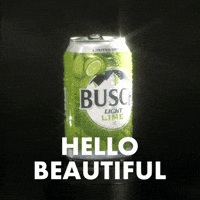 Sponsored gif. Can of Busch Light beer in the lime flavor rotates in place slowly. Its dewy exterior shines in the light. Text reads, “Hello beautiful.”
