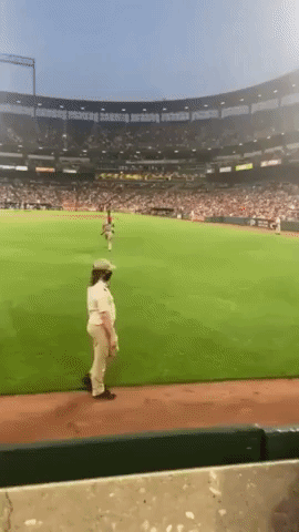LA Angels Outfielder Jo Adell Gives Young Fan Baseball Bat During Game