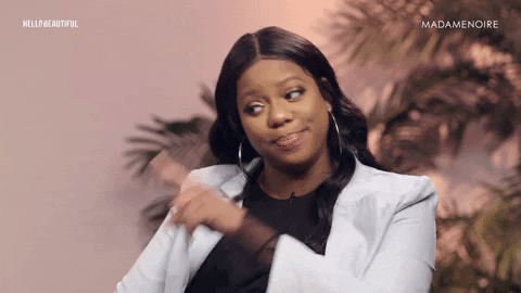 Video gif. Shamika Sanders Managing Editor of Hello Beautiful shakes her pointed index finger towards someone and looks at us saying, "That's it."