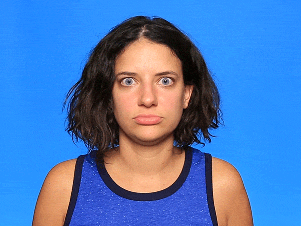 Video gif. A woman crosses her eyes and opens her mouth, making a goofy face.