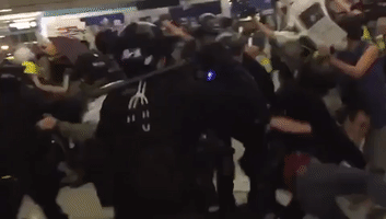 Blood Stains Hong Kong's Yuen Long Station After Baton-Wielding Riot Police Charge Protesters