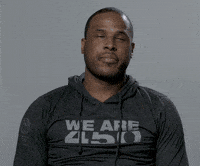 Video gif. Dion Waiters of the Miami Heat rolls his eyes and slumps back in his looking annoyed during an interview.