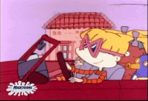 Cartoon gif. Driving a convertible, Angelica in Rugrats looks cool in sunglasses as she cruises with her doll and stuffed animal passengers.