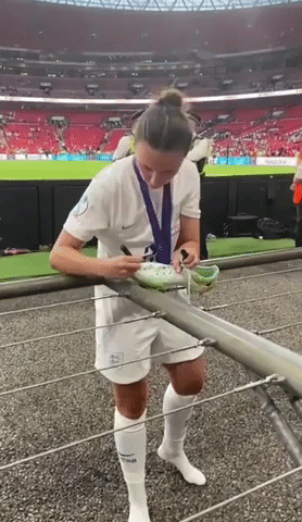 England Player Gives Boots to Young Fan