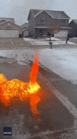 Fire Whirl Forms on Driveway as Meteorologist Burns Away Ice