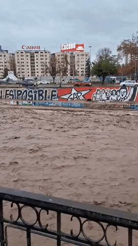 Santiago's Mapocho River Running High as Rain Swamps Chile