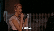 TV gif. Whitney Port as herself in The Hills holds a clipboard and smiles as she speaks knowingly into a headset. Text, "I know."