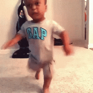 Video gif. A child runs toward us and slams the door in our face.