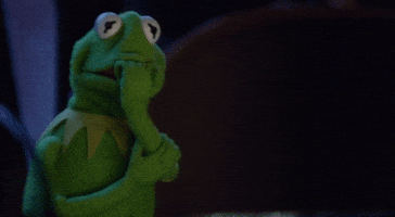 TV gif. Kermit the Frog from The Muppets chews on his frog fingers as if he has fingernails and trembles in fear.