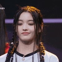 K-Pop Smirk GIF