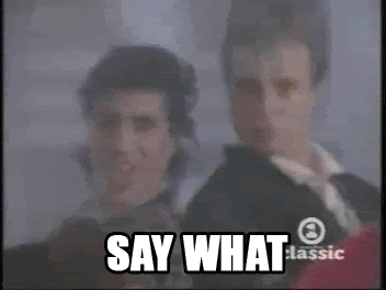 Music video gif. From the video for "Dancing on the Ceiling", Lionel Richie leans into frame and raises his eyebrows as he asks us: Text, "Say what."