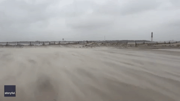 Strong Winds Blow Sand Across Beach at Southern New Jersey State Park