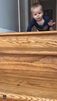 Clever 8-Month-Old Baby Masters Going Down Stairs