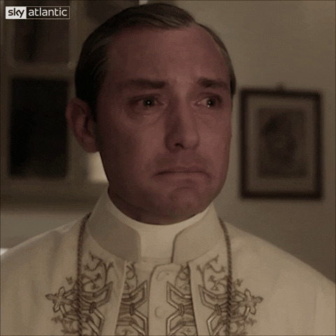 sad jude law GIF