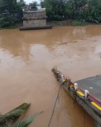 Heavy Rain, Floods Collapse Bridge in West Java