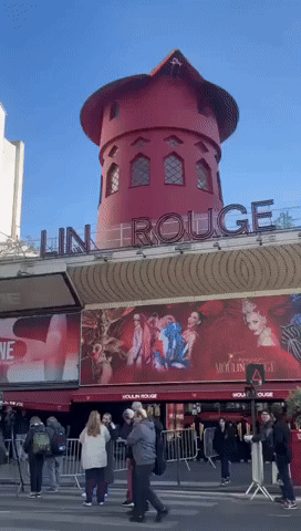 Moulin Rouge's Iconic Windmill Sails Fall Onto Paris Street
