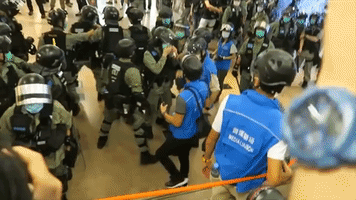 Police Disperse Protesters at Hong Kong Shopping Malls