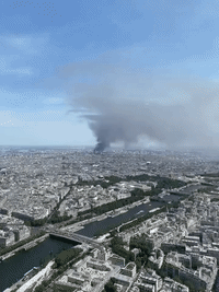 Plume of Smoke Rises Above Montmartre as Fire Burns in Paris Suburb