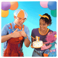 Sesame Street gif. Elmo and Abby Cadabby are wearing party hats and stand next to Meekah and Blippi. Meekah is holding a birthday cake and all of them jump up and down excitedly as they look at the cake and hype one another up.